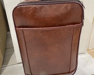 Brown 4 wheel spinner suitcase,   was $30, NOW $15