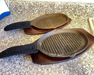 Pair of iron skillets w/wood serving boards,  was $10, NOW $7