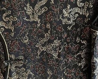 Additional closeup view of fabric on Asian dress