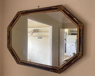 Antique mirror. Black and gilt. 
