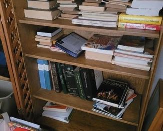 A bookcase and lots of books