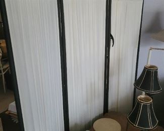 There are three of these, three panel, room dividers