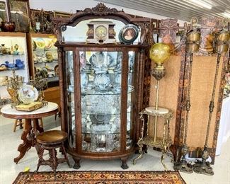 Impressive late 19th-century Northwind curved glass china cabinet 