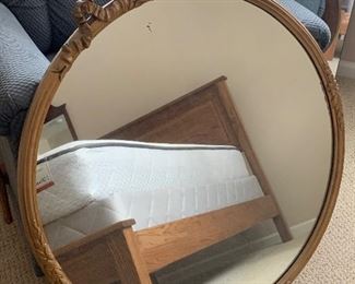 Round mirror, solid oak bed