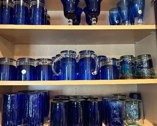 Collection of blue glasses, including Block brand glassware. 