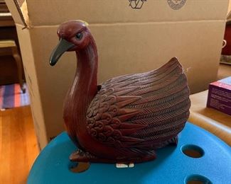 Wooden duck figurine with removable back