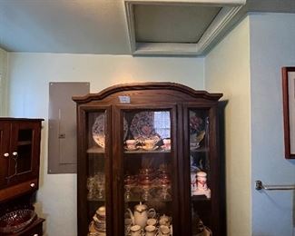 Vintage, wooden china cabinet with glass doors
