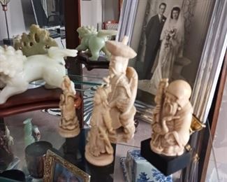 Group of Oriental carved figurines