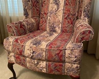 Upholstered wing-back chairs