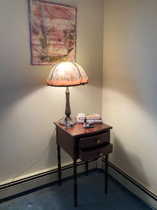 Inside painted glass shade lamp, on end table, both for sale