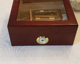 A humidor with cigars