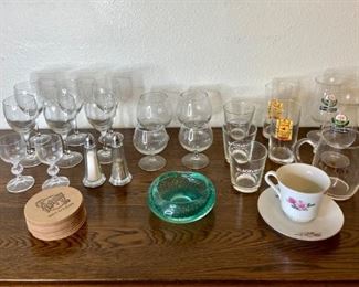 Assorted Drinkware
Includes (6) small wine glasses, (4) snifters, Gordon's gin glasses, Oranjeboom glasses, coasters and more!
