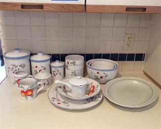 Savoir Vivre Dishware
Pattern is "Luscious". Includes (3) serving/mixing bowls; (2) serving platters; (4) bowls; (1) mug; (1) sugar bowl; (1) creamer; and (3) canisters. Also includes (1) Pfaltzgraff serving platter and Chef's creamer. Normal wear from use.