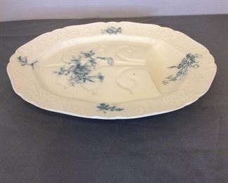 Large Serving Platter
Large floral motif platter, well loved. There is a name on the bottom, but it's illegible. Measures W19" x D15".
