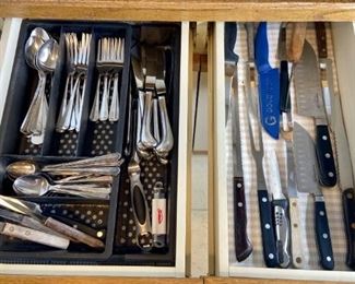 Assorted Flatware
Includes stainless steel flatware, Calphalon knives, and more.