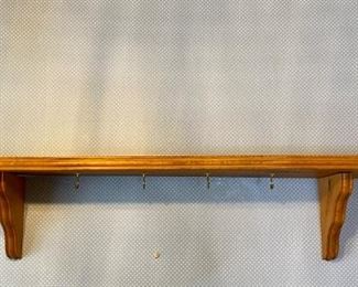 Wooden Spice Rack & Shelf
Spice rack, H18" x W14 1/2" x D3" with grapes on the front. Shelf measures H10" x W47" x D9" and has (6) cup hooks. Must be removed from the wall.