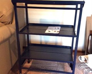 Oasis Concepts Folding Cart
Model No. FNFTray - 1C, folding island with (2) shelves. Blue metal with wooden top tray with floral design. H36" x W25" x D17 1/2".