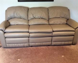 Tan Leather-Like Recliner Sofa
(3) seater sofa with (2) reclining ends. Both recliners work. Some marking on couch and tears in the fabric. See photos. H31" x W81" x D37".