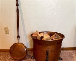 Copper Fireplace Accessories
Copper colored firewood holder - H15 1/2" x W18" and bed warmer with wooden handle - 40"L.