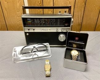 Wenger Men's Watch & More
"Commander Chronograph", includes manual. Also includes Timex gold-toned watch; New Winchester safety glasses; Realistic Astronaut - 6 AM/FM electric or battery powered radio - powers on.