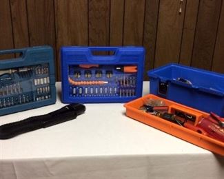 Tool Variety
Allied 53-piece ratcheting screwdriver set, Master Grip 65-piece fearless ratchet and bit driver socket set; Black and Decker snake light; Builder's Square toolbox with various tools inside.