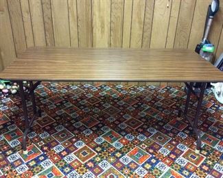 Wood & Metal Folding Table
Old-school folding table with wood laminate top and metal legs. Measures H29" x W60" x D30". Some scratches and scuffs on the top.