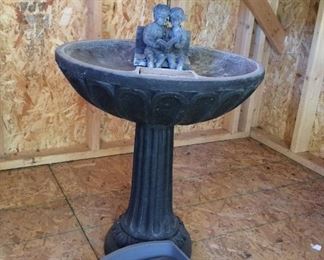 Solar Powered Bird Bath
Solar powered black bird bath with "boy and girl on bench" figurine. H34" at top of figurine, H24" without, W24".