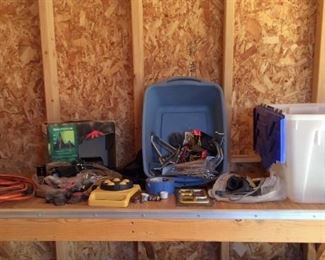 Sprinkler and Garage Items
Includes sprinkler heads, extension cords, peg board parts, large yard trash bags, and much more.