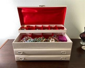 Costume Jewelry and Box
Jewelry Box, H 7" x W 15" x D 8". Opens on top with (2) drawers. Various costume jewelry pieces including necklaces, earrings, bracelets and more.