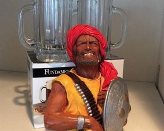 Bossons Chalkware Head Pathan Warrior Wall Plaque and (4) NEW Fundamentals Beer Mugs
Bossons Chalkware Head Pathan Warrior Wall Plaque ca. 1967 Made in England, H 9" x W 11" x D 4 1/2". A few knicks; NEW in box (4) Fundamentals beer mugs, 16 ounce.