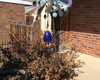 Yard Pretties!
Large metal windmill, H73" x W24"; glass wind chime; terra cotta sun face. Heavy and large.