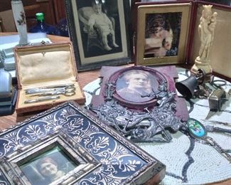 Antique picture frames, sewing kits, candle, snippers, carvings , signed paintings, enamel pieces