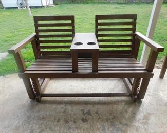 Teak rocker in good condition.  Has two side chairs.   This set was hand built and custom built for our family.
