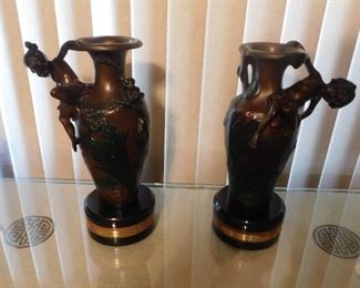A beautiful and elegant pair of  Auguste Moreau bronze vases with figures of a girl and boy.