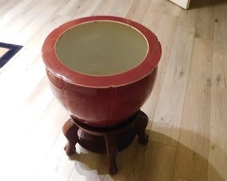 Large solid plant pot and stand.