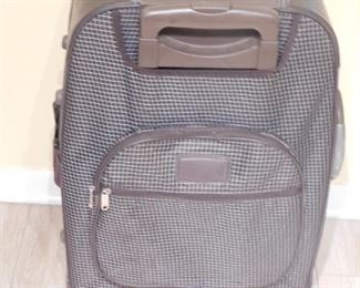 Almost new suitcase (pic does not do justice) for your next vacation.  In great condition.