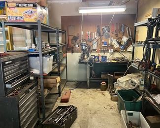 Tools! Shelves and cabinets. ALL need to go!