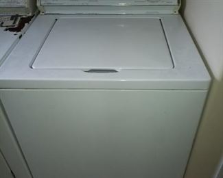 Whirlpool washer, there is a dryer here also.  The dryer is 20 bucks,  looks ugly but works great