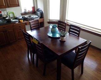 Dining Room  Table with 1 leaf and 6 chairs