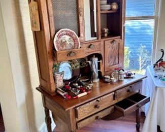 Antique hoosier (client referred to it as kitchen dresser) w/ 4 flat drawers, 2 metal flour drawers, 1 pullout drawer, and 2 cupboards with screens