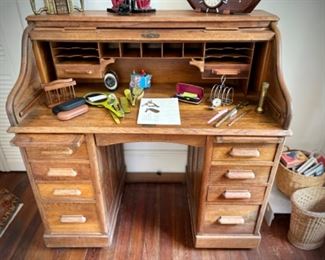Anqtique rolltop desk with hidden drawers 