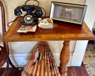 Vintage inlaid "C" table on wheels and antique 1936 telephone