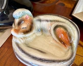 Chipmunk ash tray (cigarette rests on nose)
