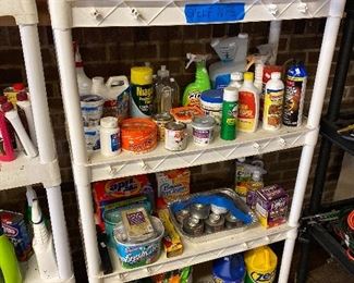 A little bitt of everything can be found in this garage lined with packed shelves.