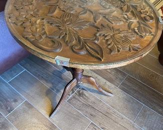 Hand carved table. This is an amazingly detailed furniture item.