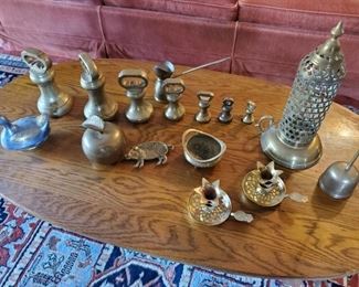 Brass paper weights,  candle holders,  etc