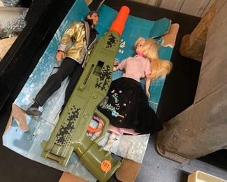 Elvis on stage dolls and toy gun 