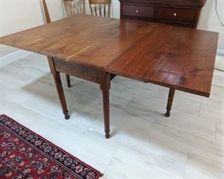 Antique drop leaf table, fully restored, comes w/padded covers