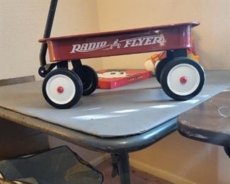 Small Radio Flyer wagon.  Your baby will not fit, so don't even try.