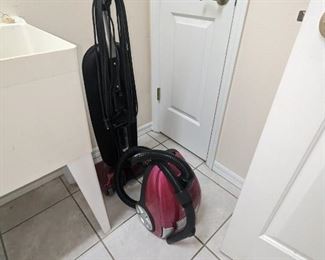 Vacuums upright $60, canister $80